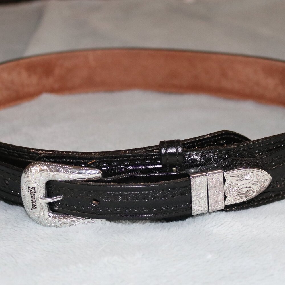 Nocana Belt Co. black leather belt with silver buckles. New. Size 32.